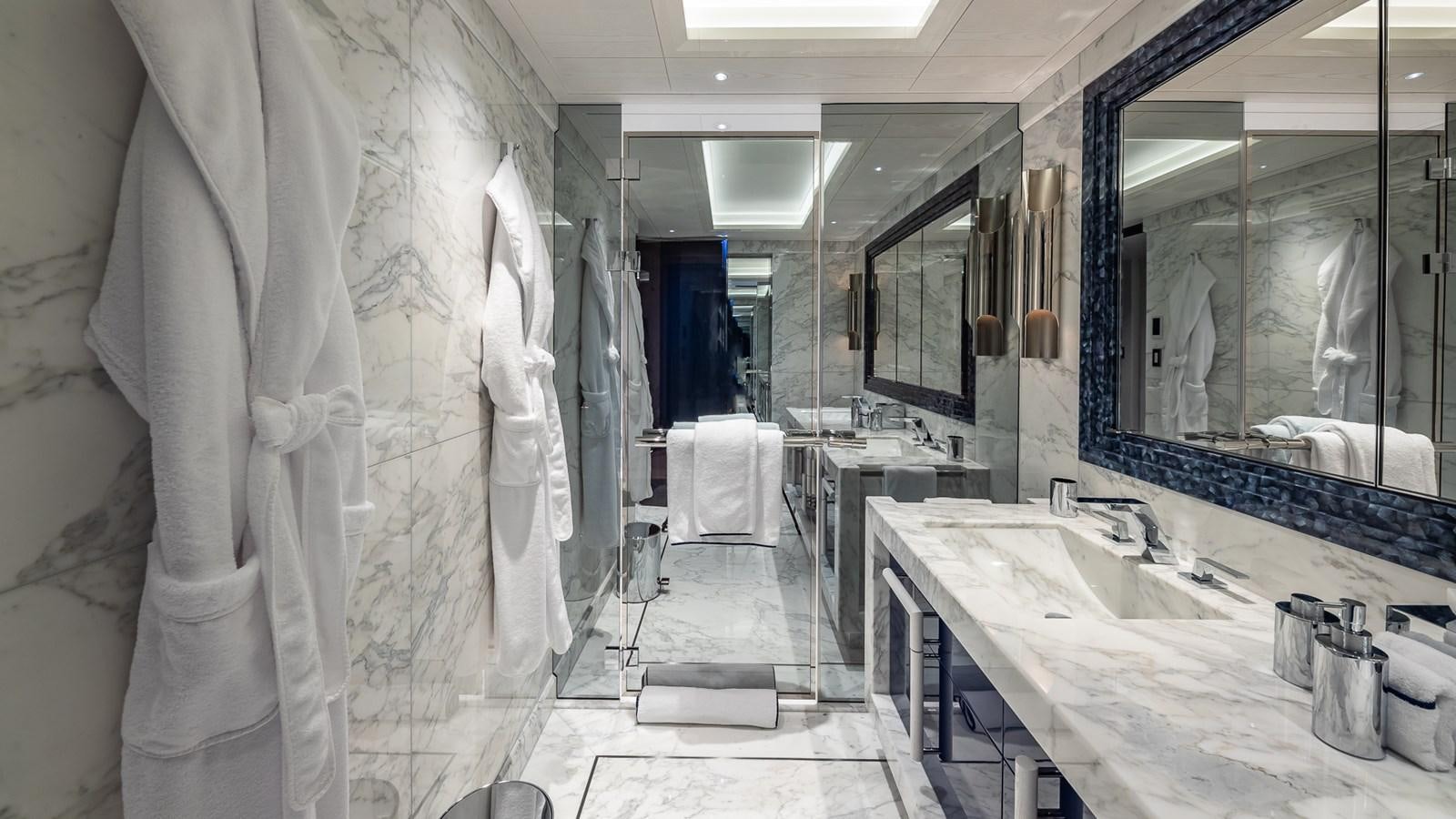 a bathroom with a marble countertop aboard CC-SUMMER Yacht for Sale