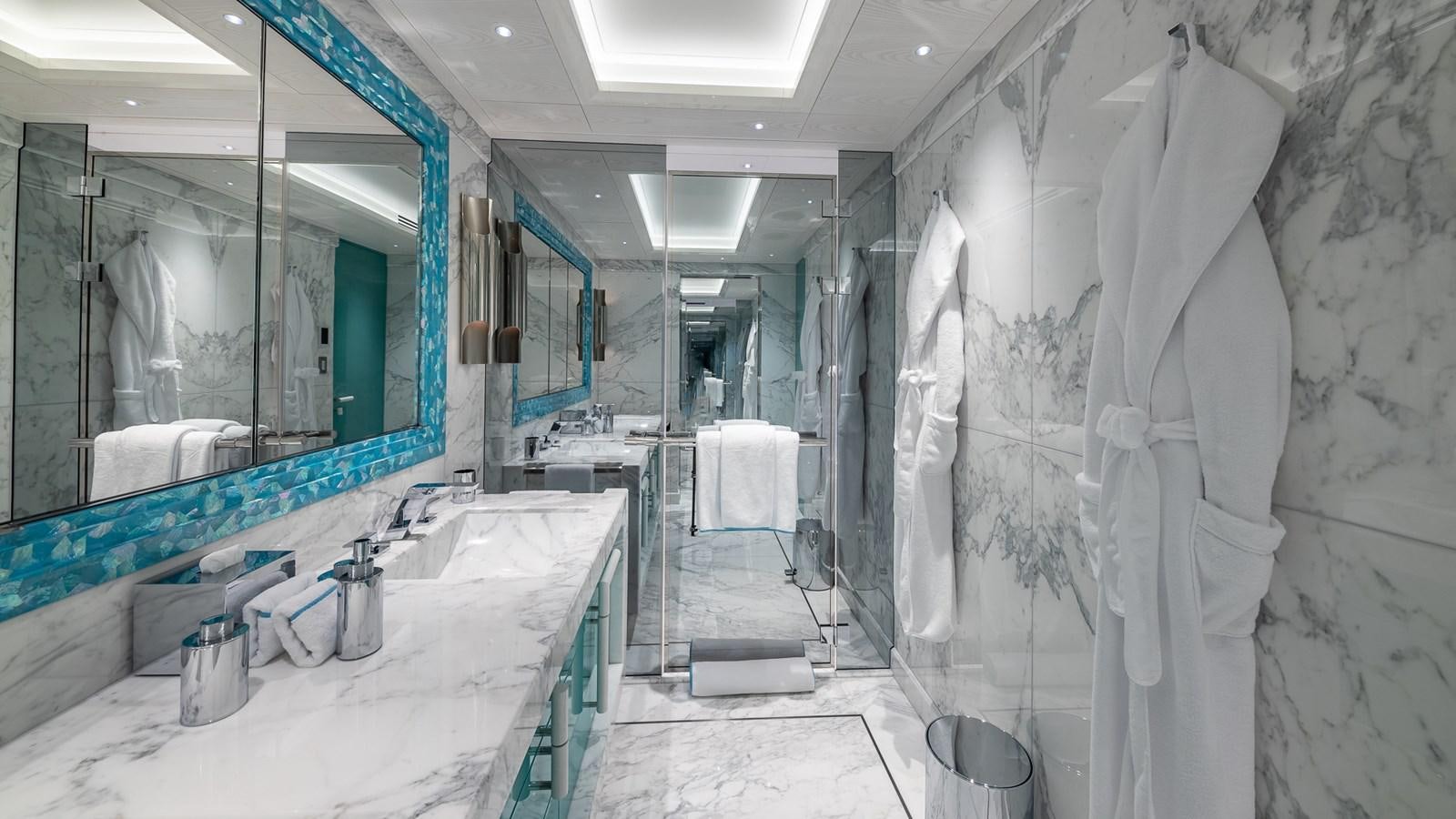 a bathroom with a marble countertop aboard CC-SUMMER Yacht for Sale