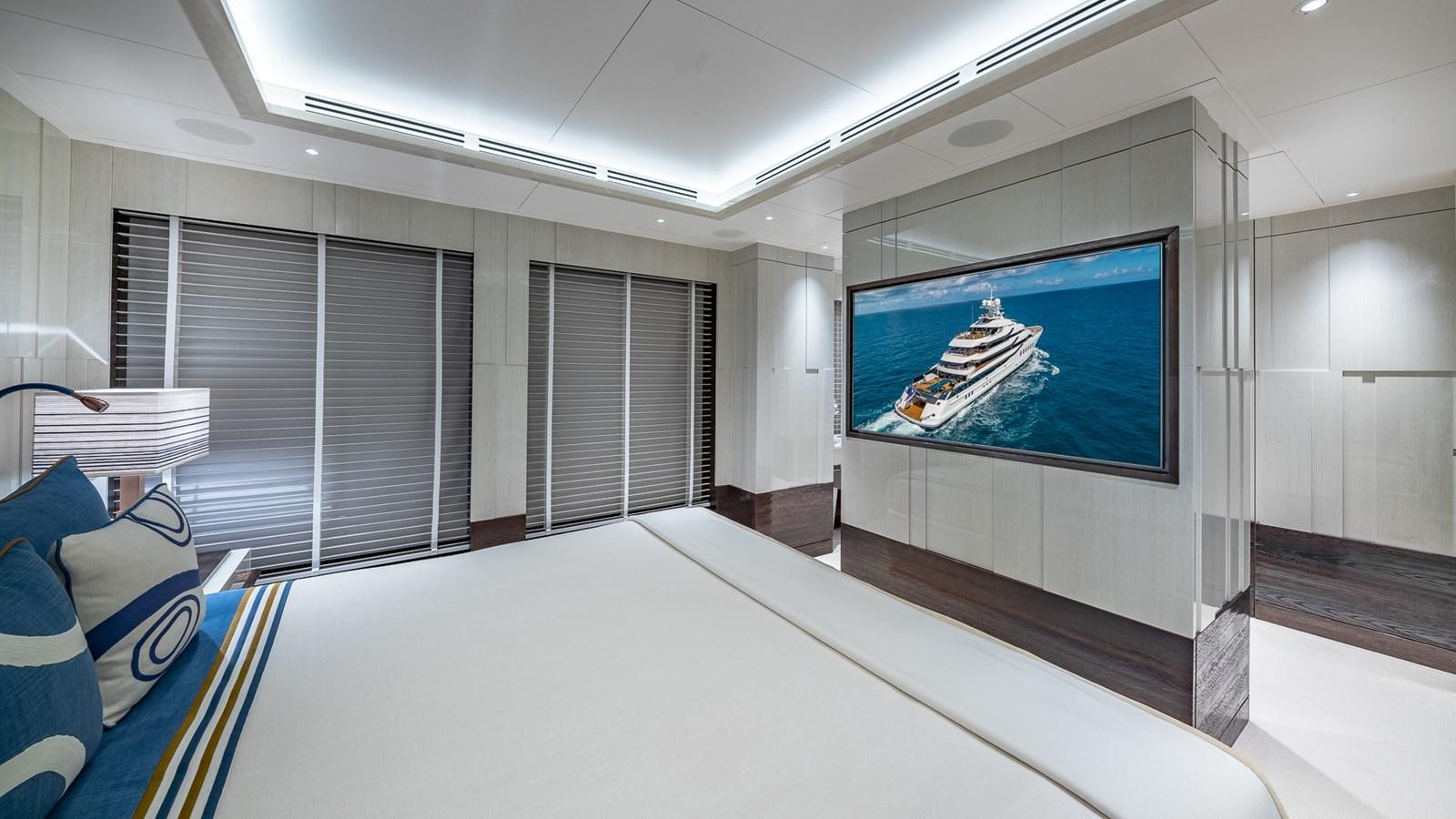 a room with a large screen aboard CC-SUMMER Yacht for Sale