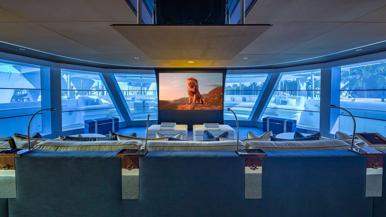 a large room with a large window and a picture on the wall aboard CC-SUMMER Yacht for Sale