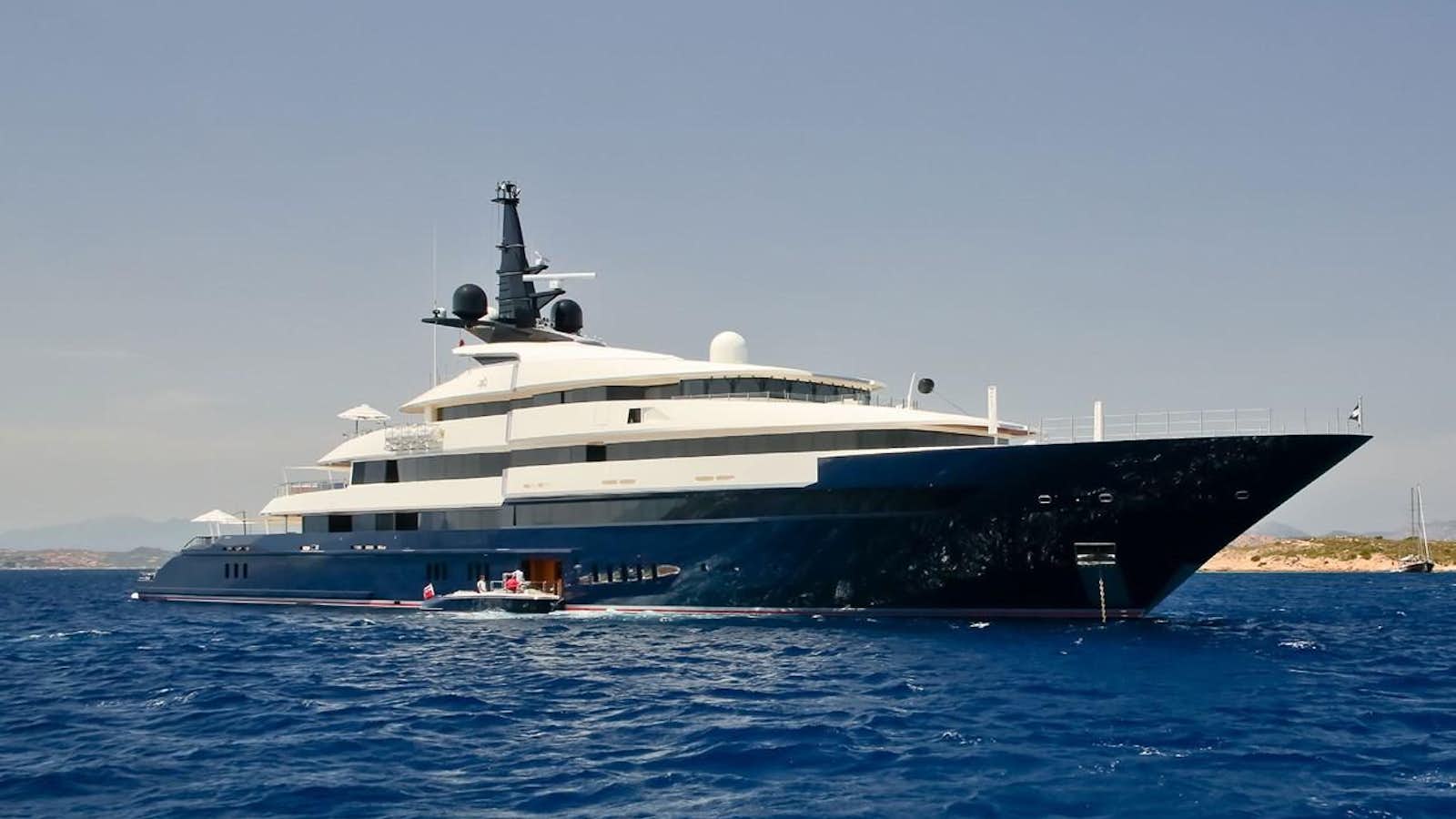a large ship in the water aboard MAN OF STEEL Yacht for Sale