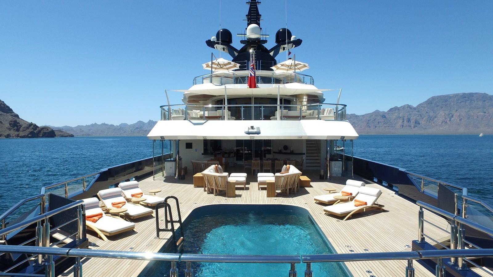 a boat on a body of water aboard MAN OF STEEL Yacht for Sale