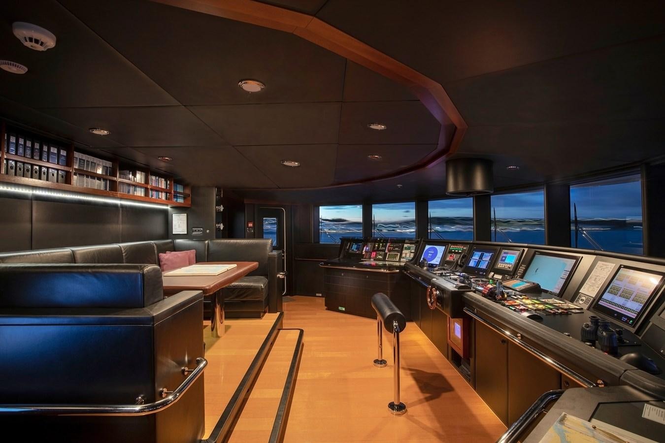 a room with many computers aboard HBC Yacht for Charter
