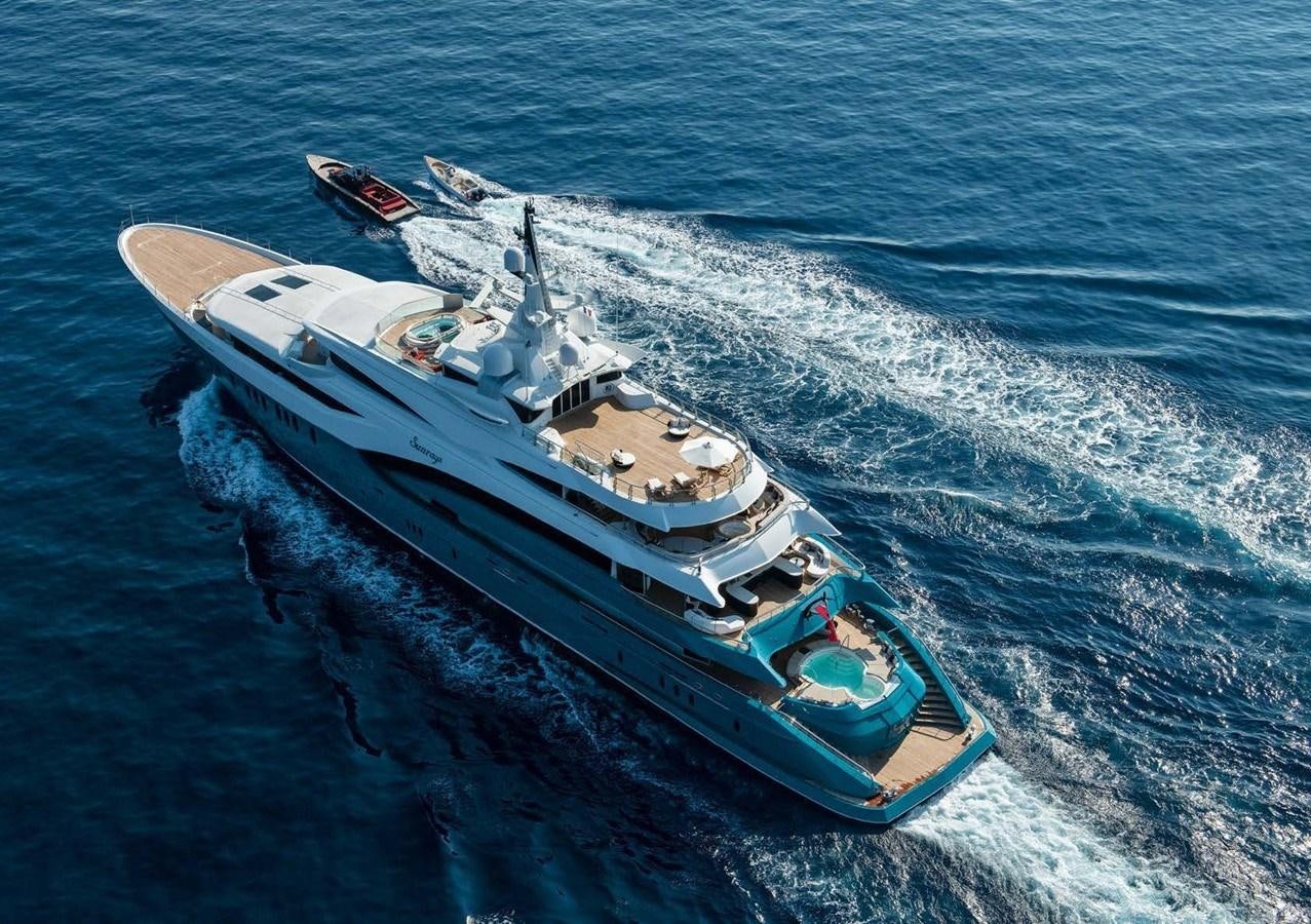 a military ship in the ocean aboard SUNRAYS Yacht for Sale