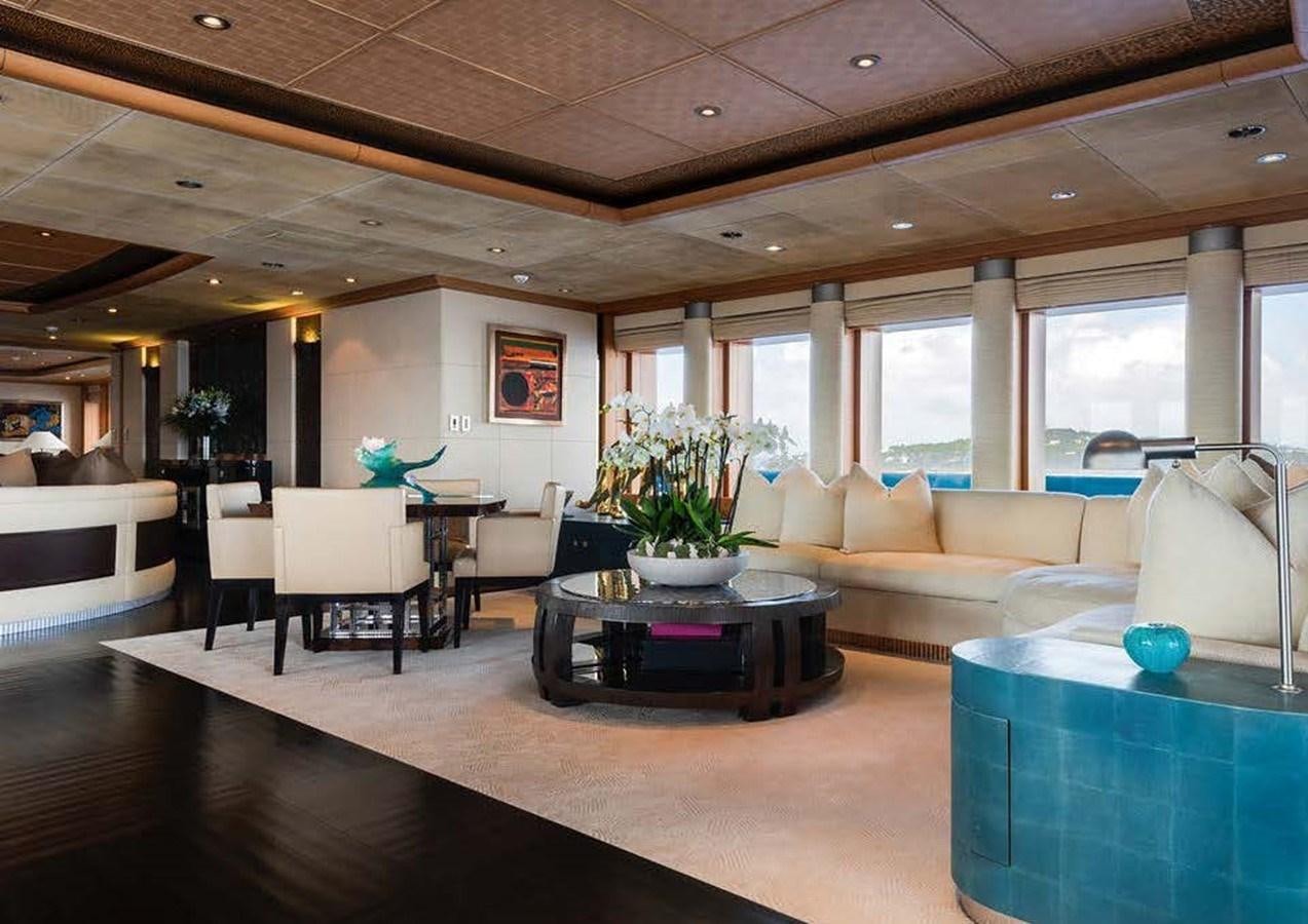 a living room with a large window aboard SUNRAYS Yacht for Sale