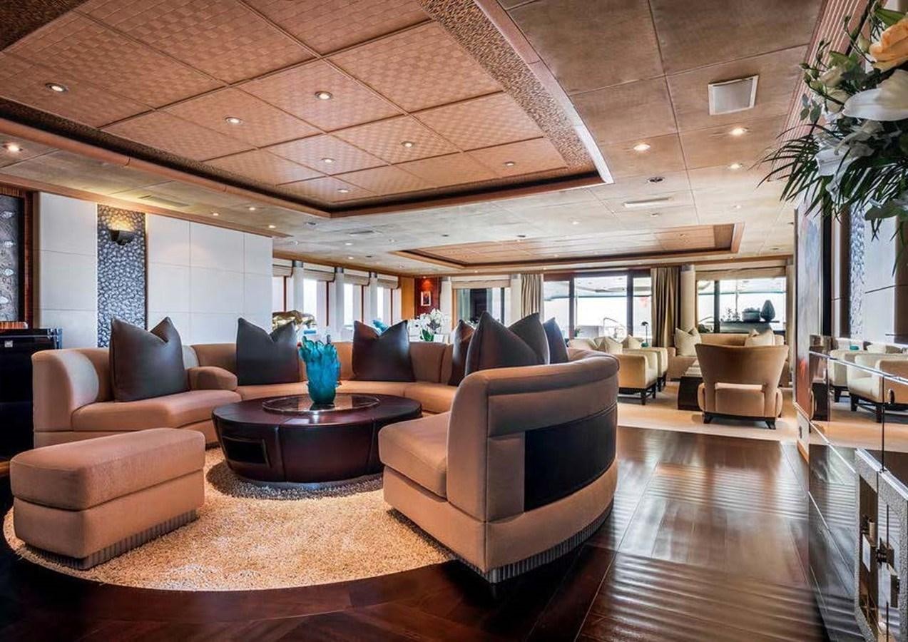 a living room with a wood floor aboard SUNRAYS Yacht for Sale
