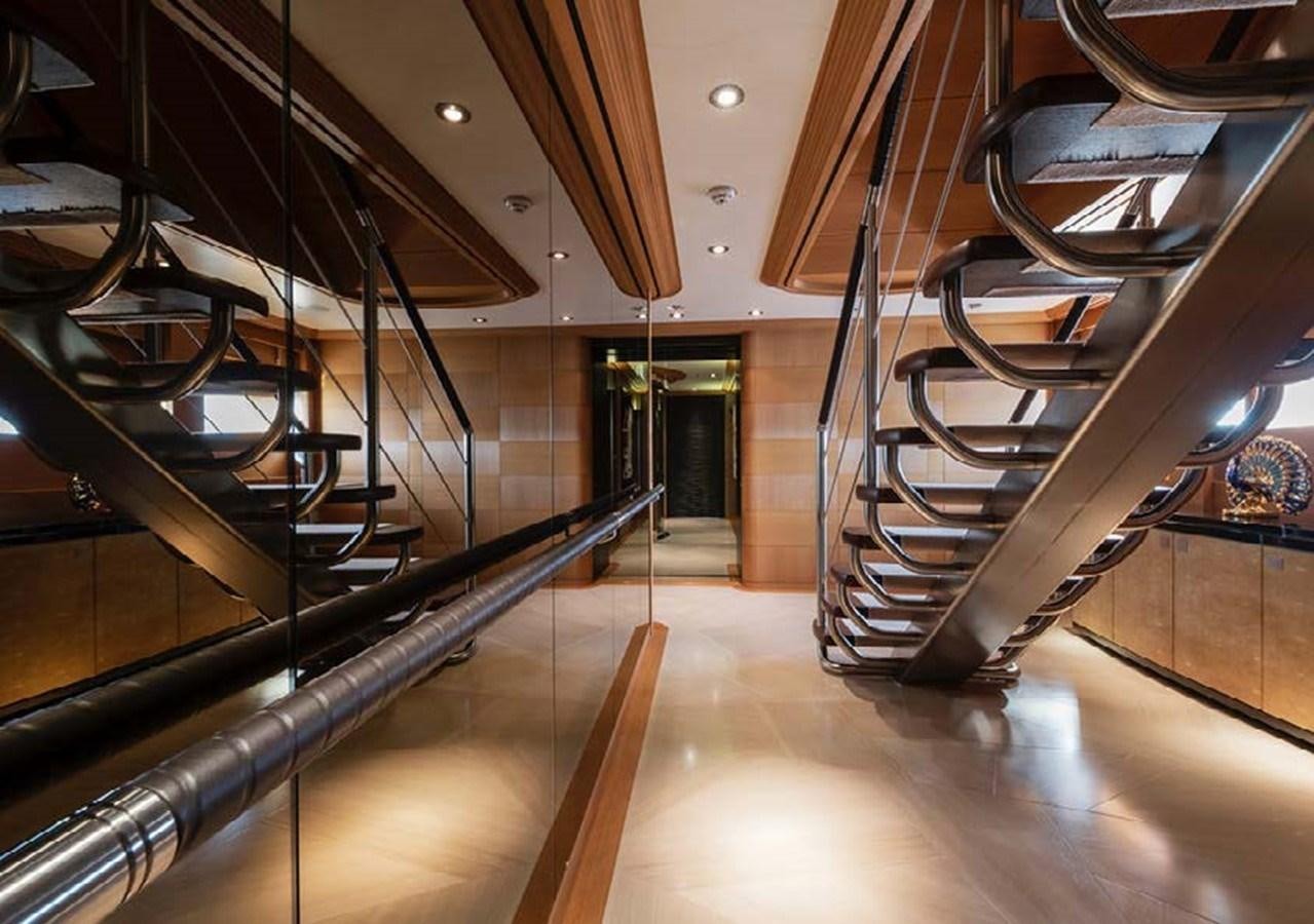 a large metal staircase aboard SUNRAYS Yacht for Sale