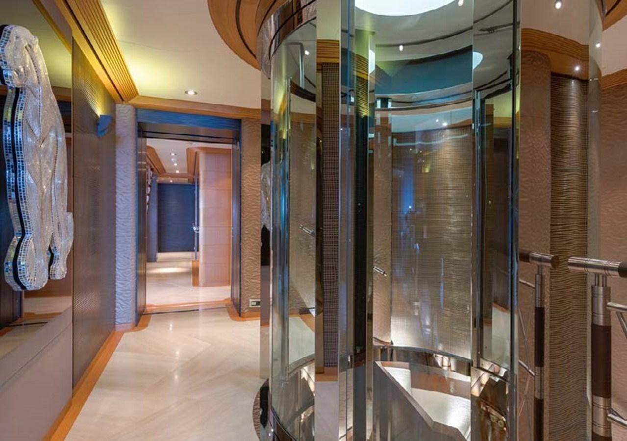 a room with several glass doors aboard SUNRAYS Yacht for Sale