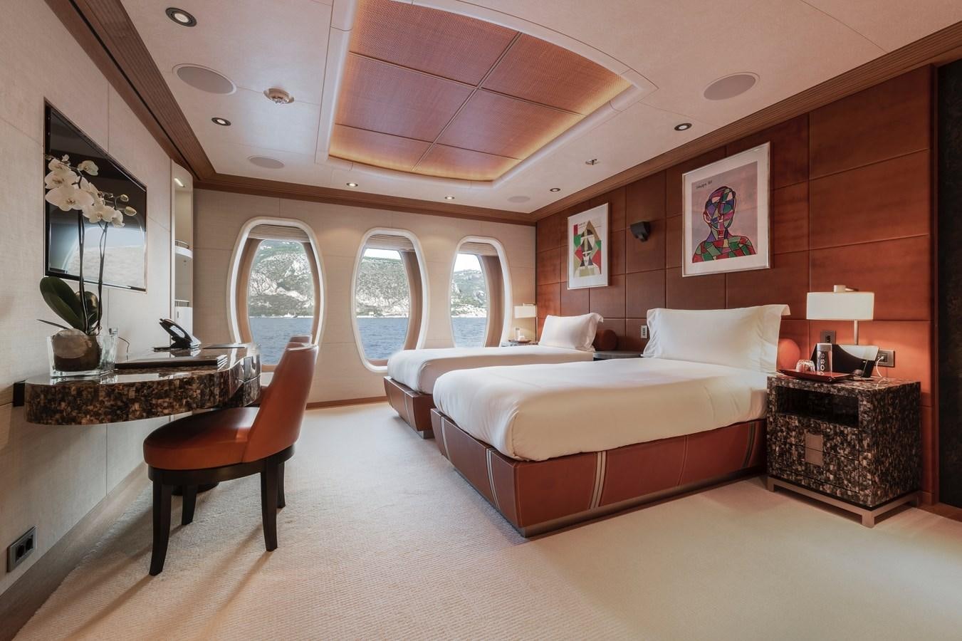 a large bedroom with a large bed aboard SUNRAYS Yacht for Sale