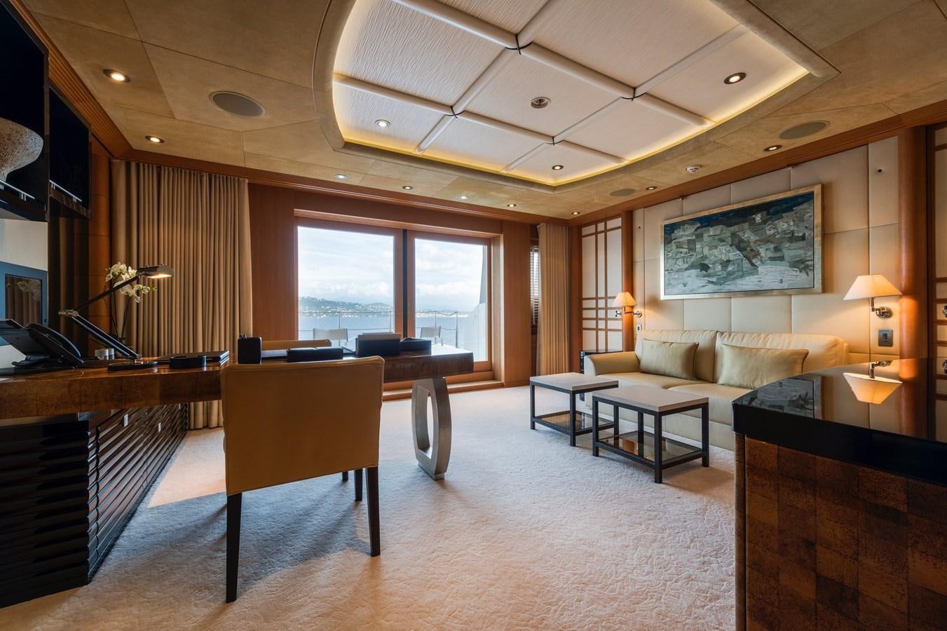 a living room with a large window aboard SUNRAYS Yacht for Sale