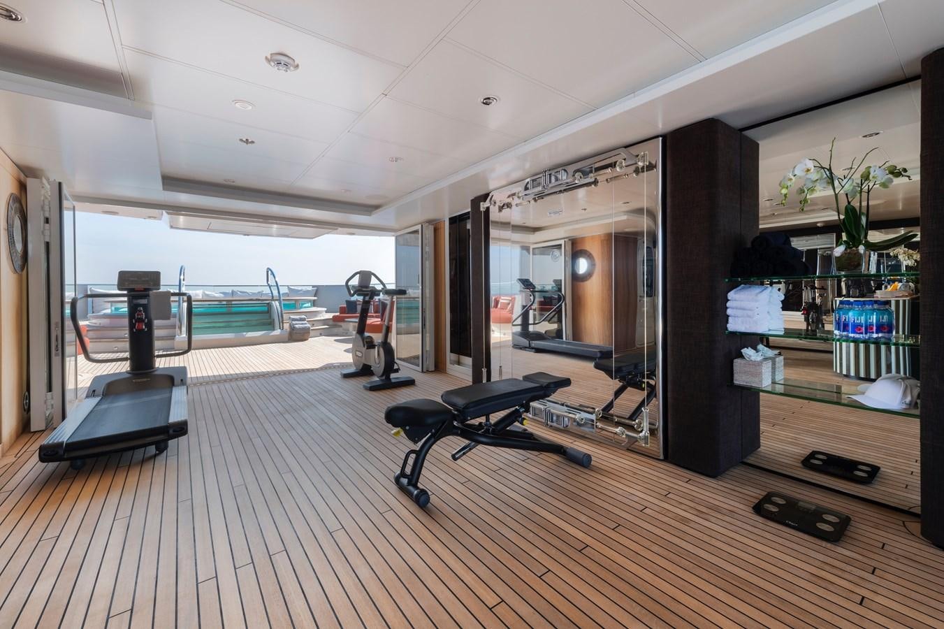 a room with a bench and a stroller aboard SUNRAYS Yacht for Sale