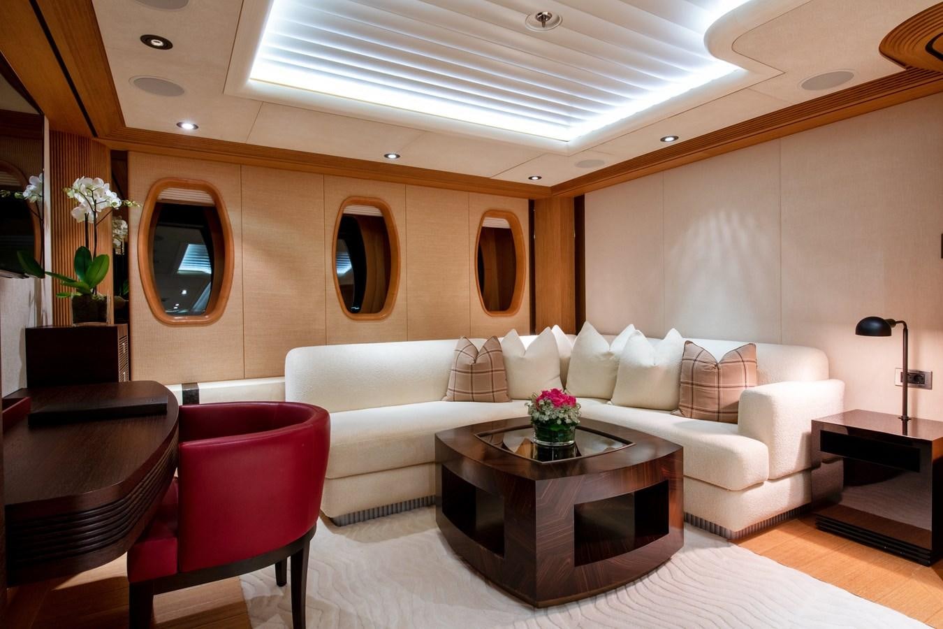 a living room with a large mirror aboard SUNRAYS Yacht for Sale