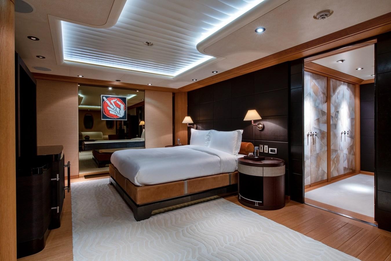 a large bedroom with a large bed aboard SUNRAYS Yacht for Sale