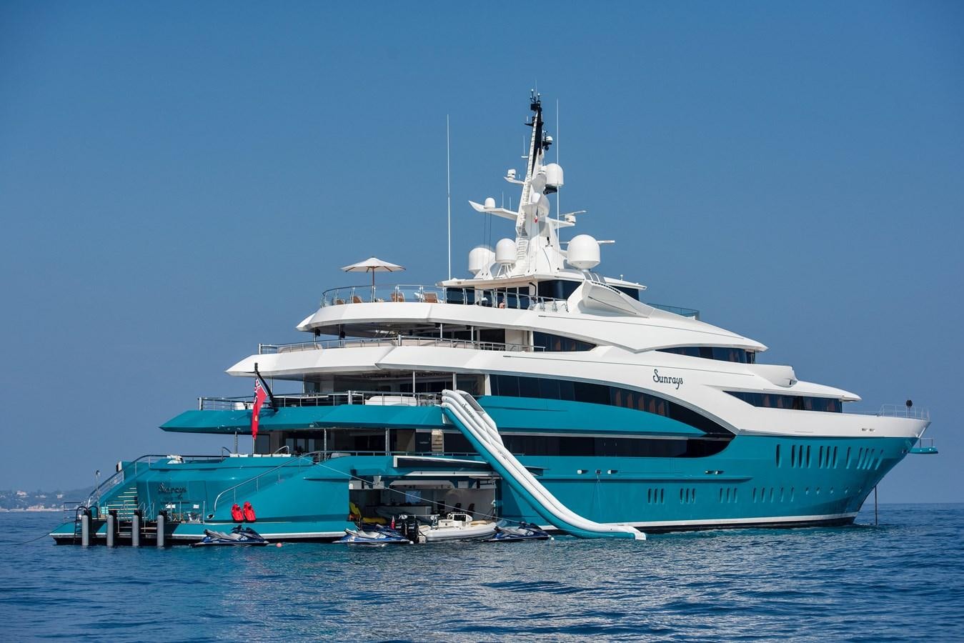 a large white boat in the water aboard SUNRAYS Yacht for Sale
