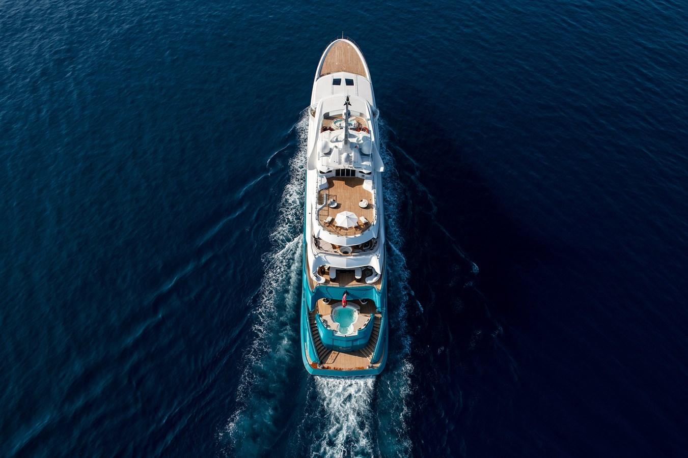a large ship in the water aboard SUNRAYS Yacht for Sale