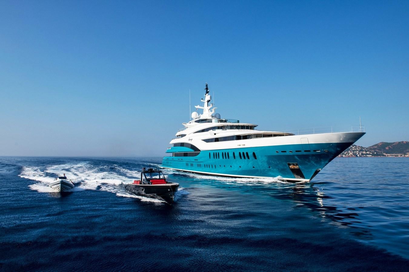 a large ship on the water aboard SUNRAYS Yacht for Sale