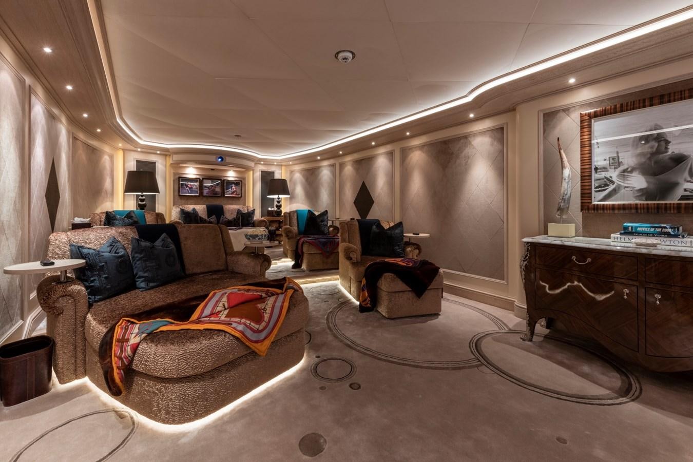 a living room with a couch and a coffee table aboard EYE Yacht for Sale