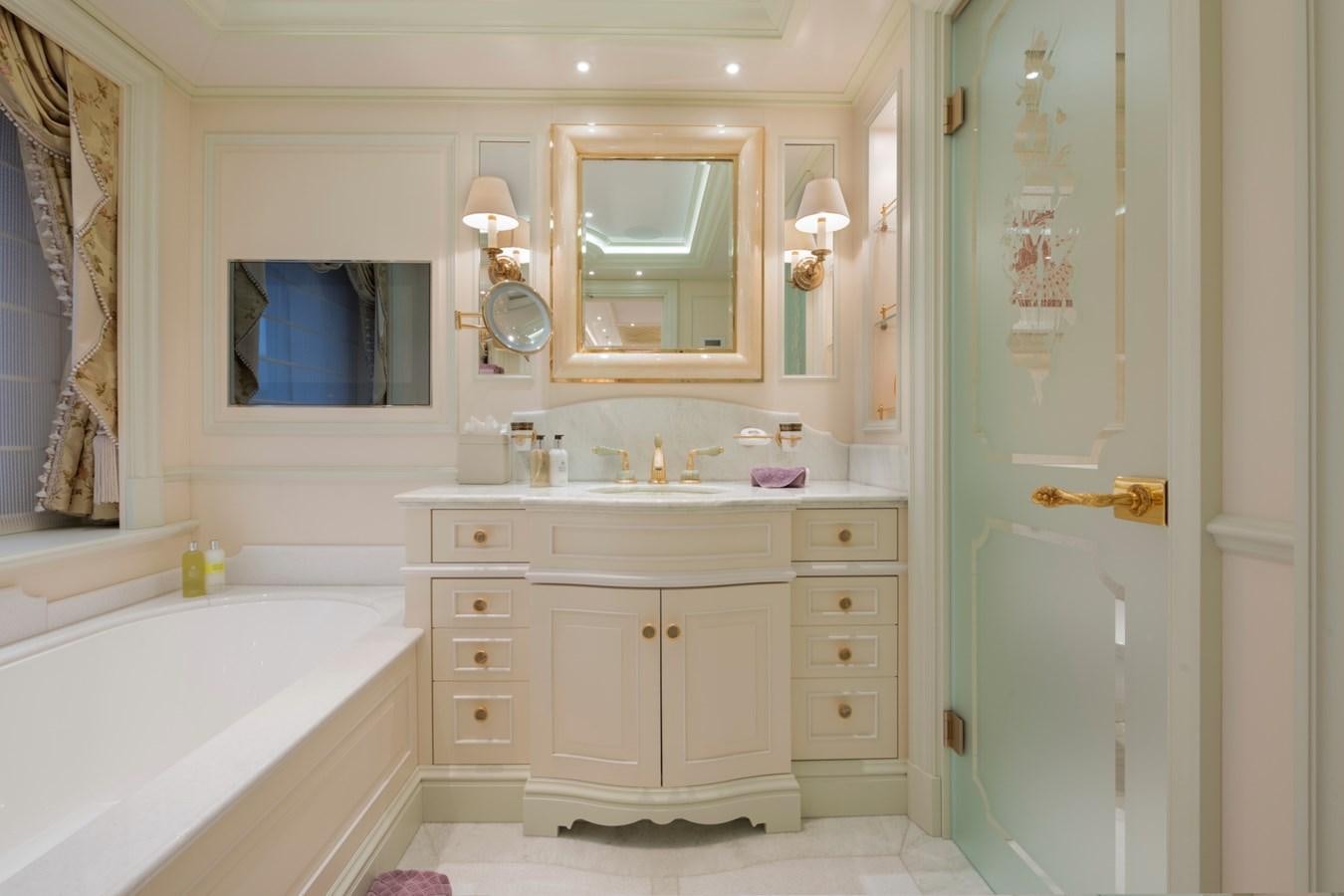 a bathroom with a sink and a mirror aboard EYE Yacht for Sale