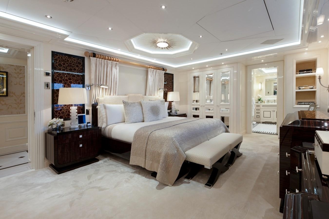 a couple of beds in a hotel room aboard EYE Yacht for Sale