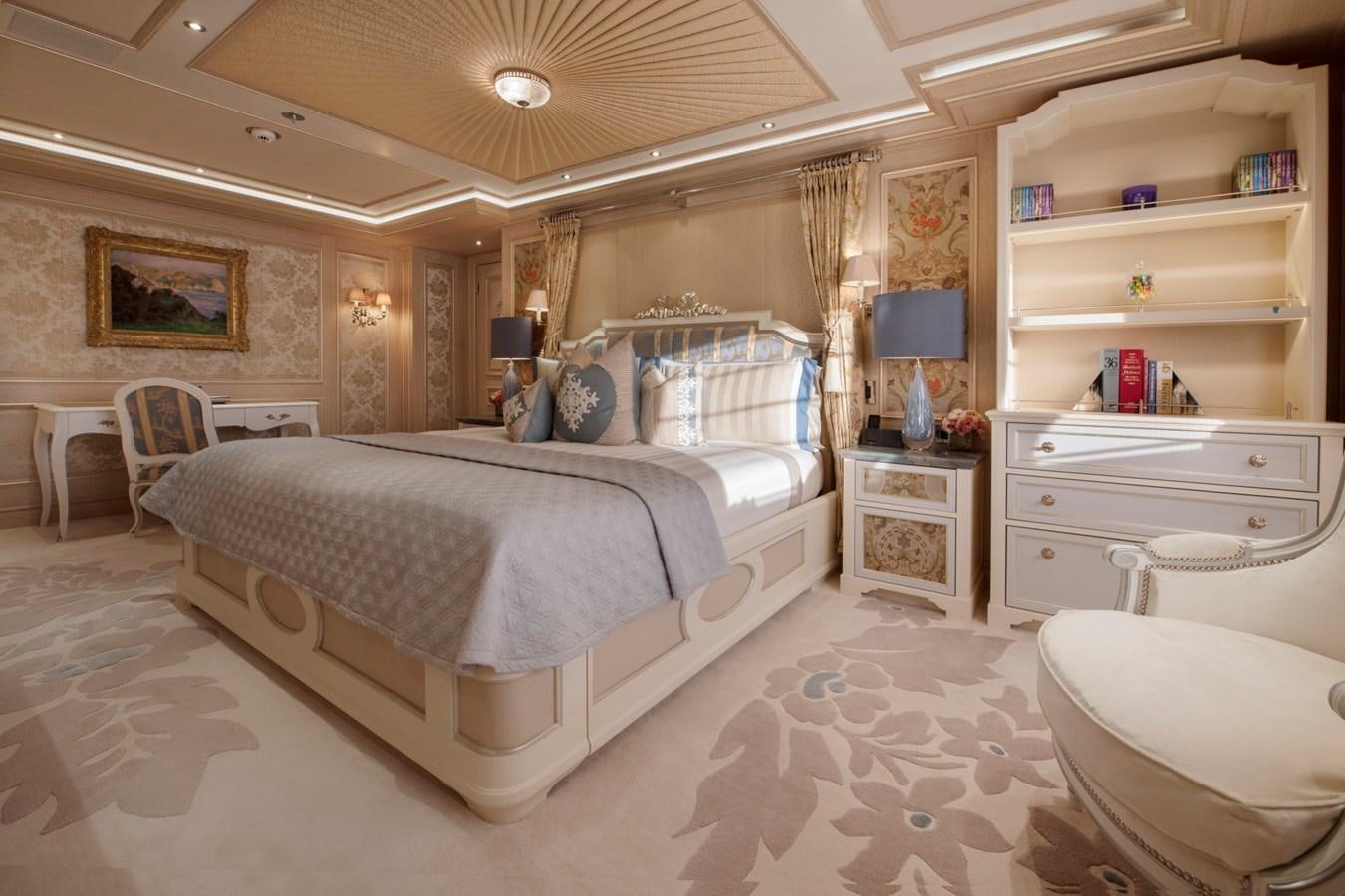 a large bedroom with a large bed aboard EYE Yacht for Sale