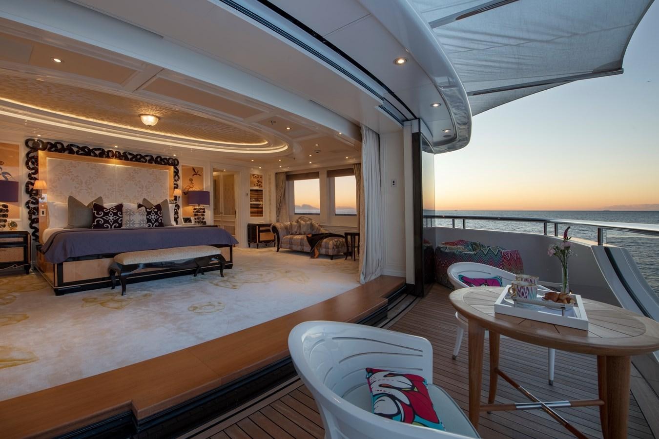 a large bedroom with a large bed aboard EYE Yacht for Sale