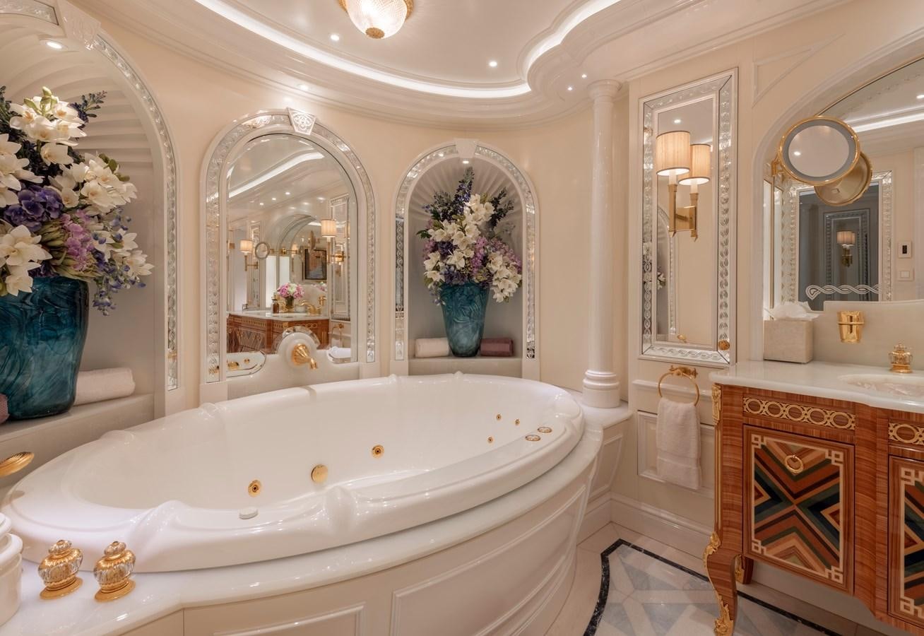 a bathroom with a large bathtub aboard EYE Yacht for Sale