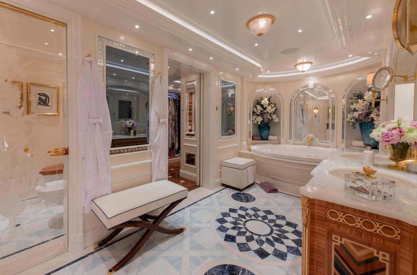 a bathroom with a large mirror aboard EYE Yacht for Sale