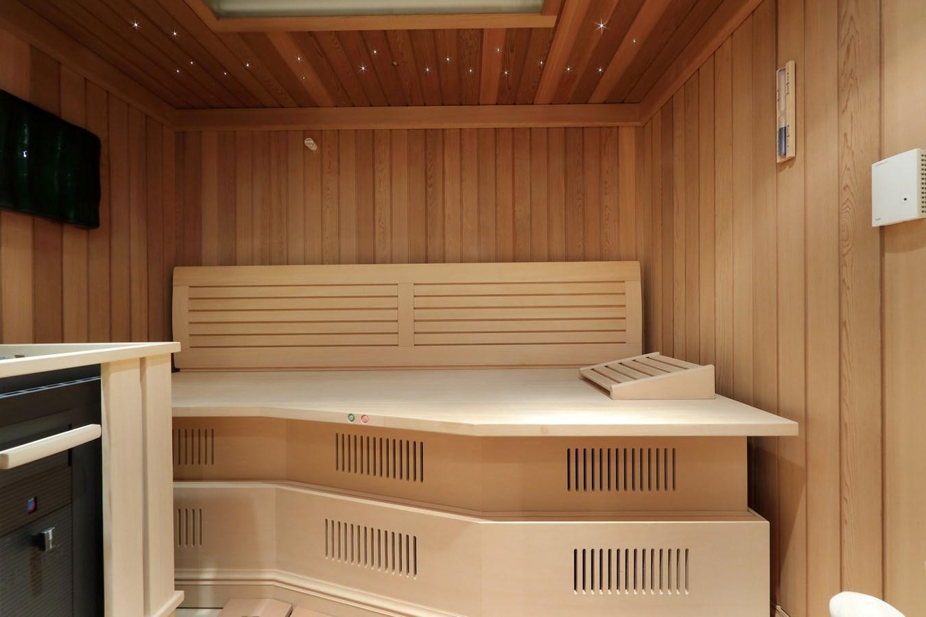 a room with a shelf and a computer aboard EYE Yacht for Sale