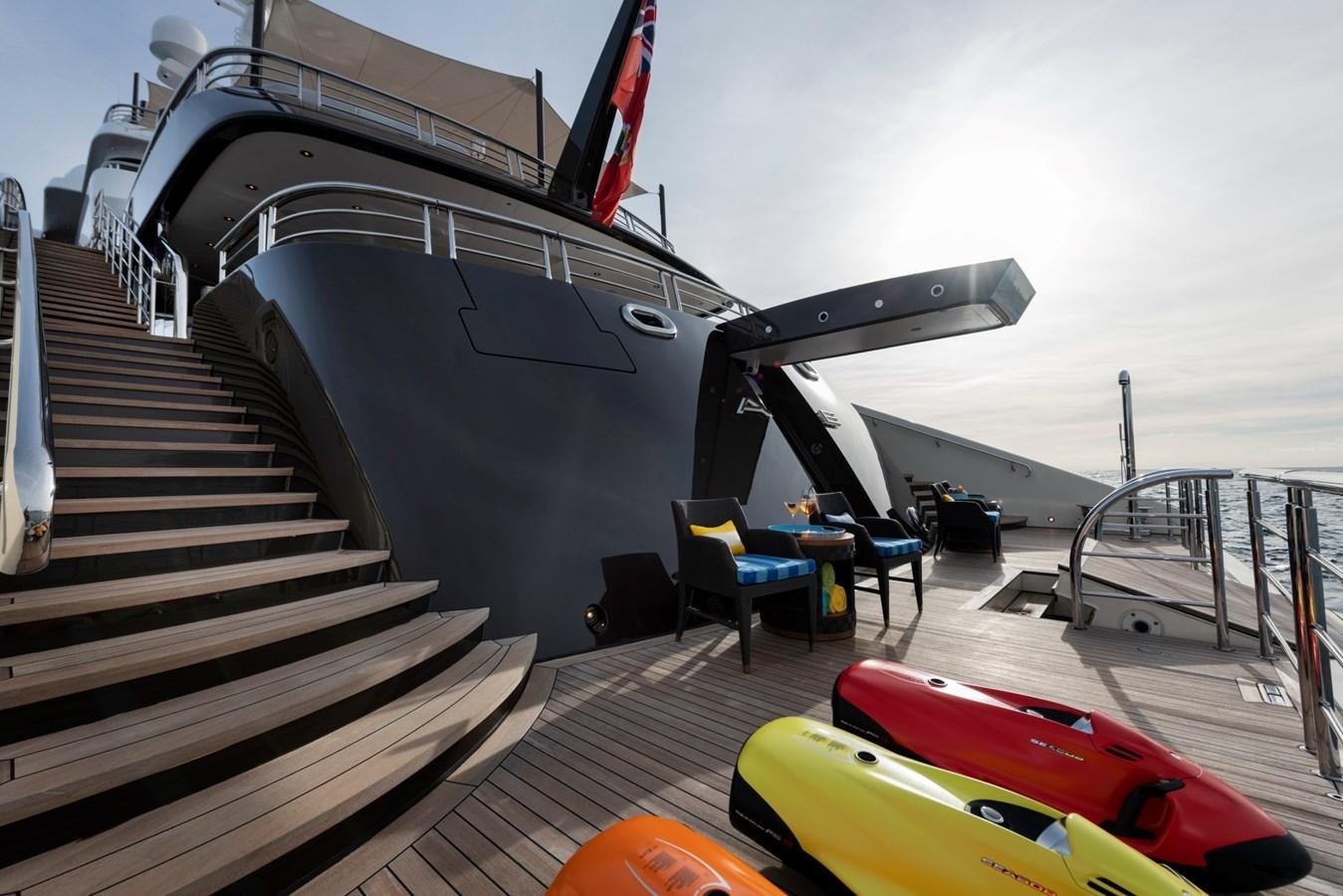 a boat with a red and black flag on the deck aboard EYE Yacht for Sale