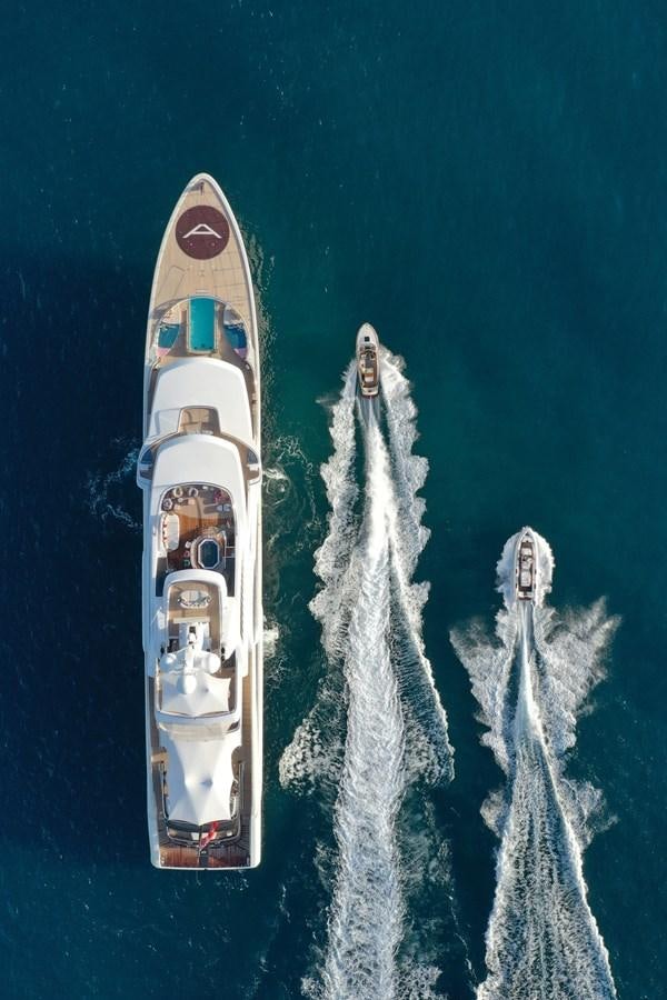 a white and red boat in the water aboard EYE Yacht for Sale