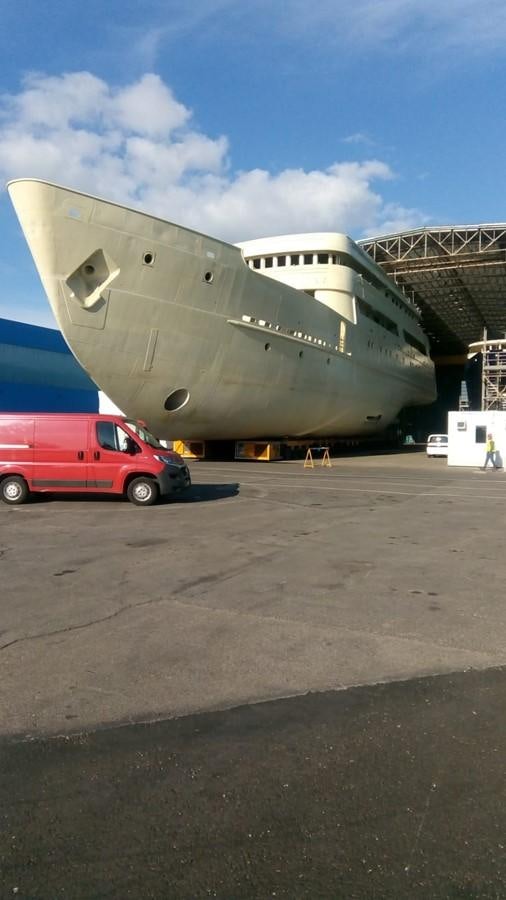 a large airplane in a hangar aboard SIMON FRASER Yacht for Sale