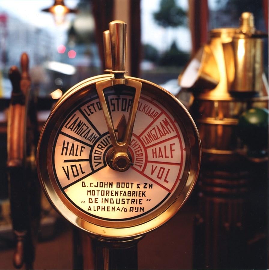 a clock on a glass case aboard MAJESTEIT Yacht for Sale