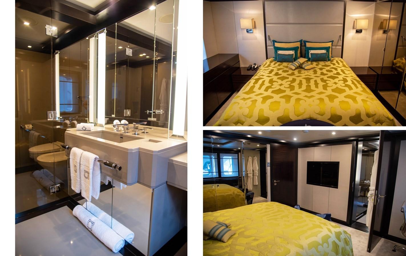 a room with a bed and a desk aboard LADY VERA Yacht for Charter