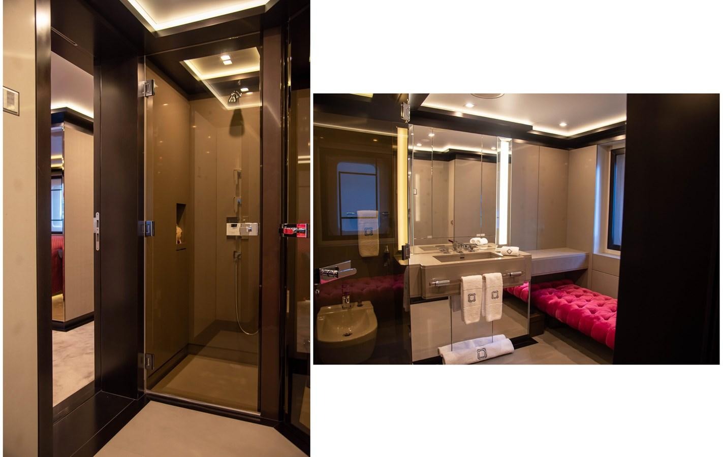 a room with a mirror and a bed aboard LADY VERA Yacht for Charter