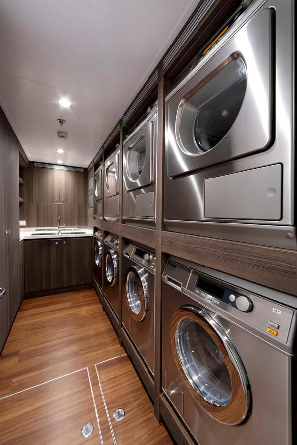 a kitchen with stainless steel appliances aboard PLANET NINE Yacht for Charter
