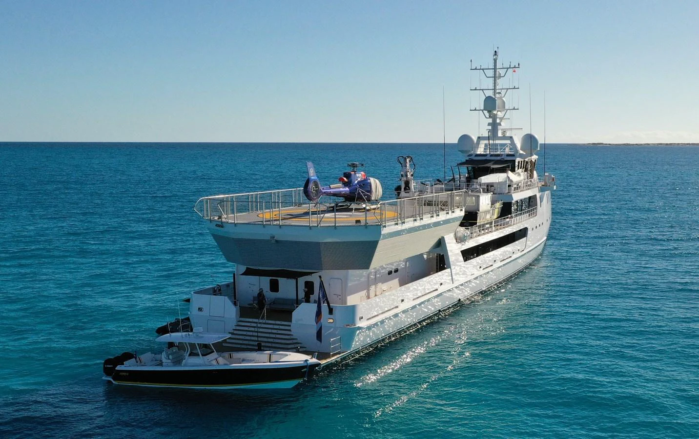 a boat with people on it aboard INDRATUS Yacht for Sale