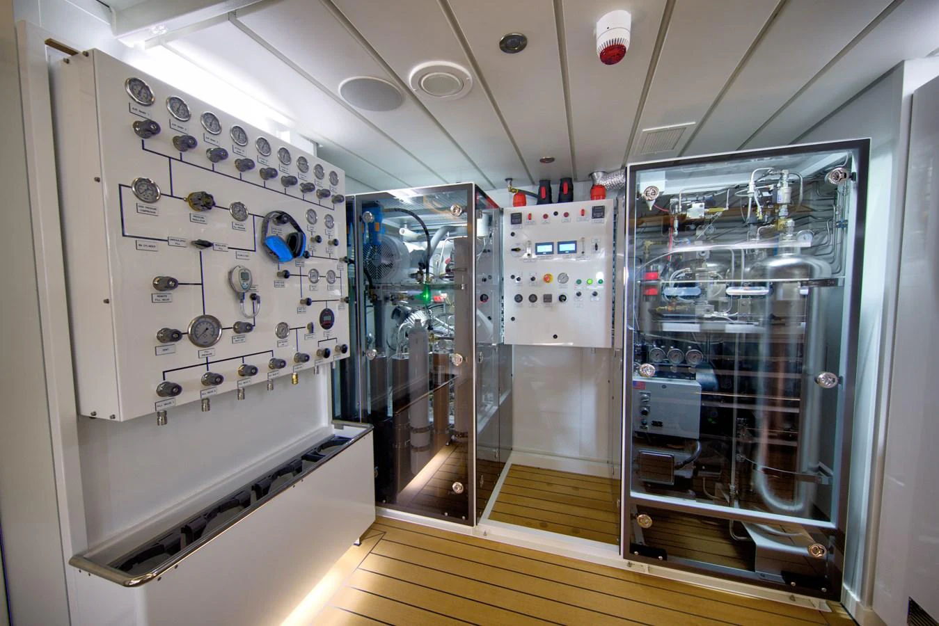 a room with equipment and lights aboard INDRATUS Yacht for Sale