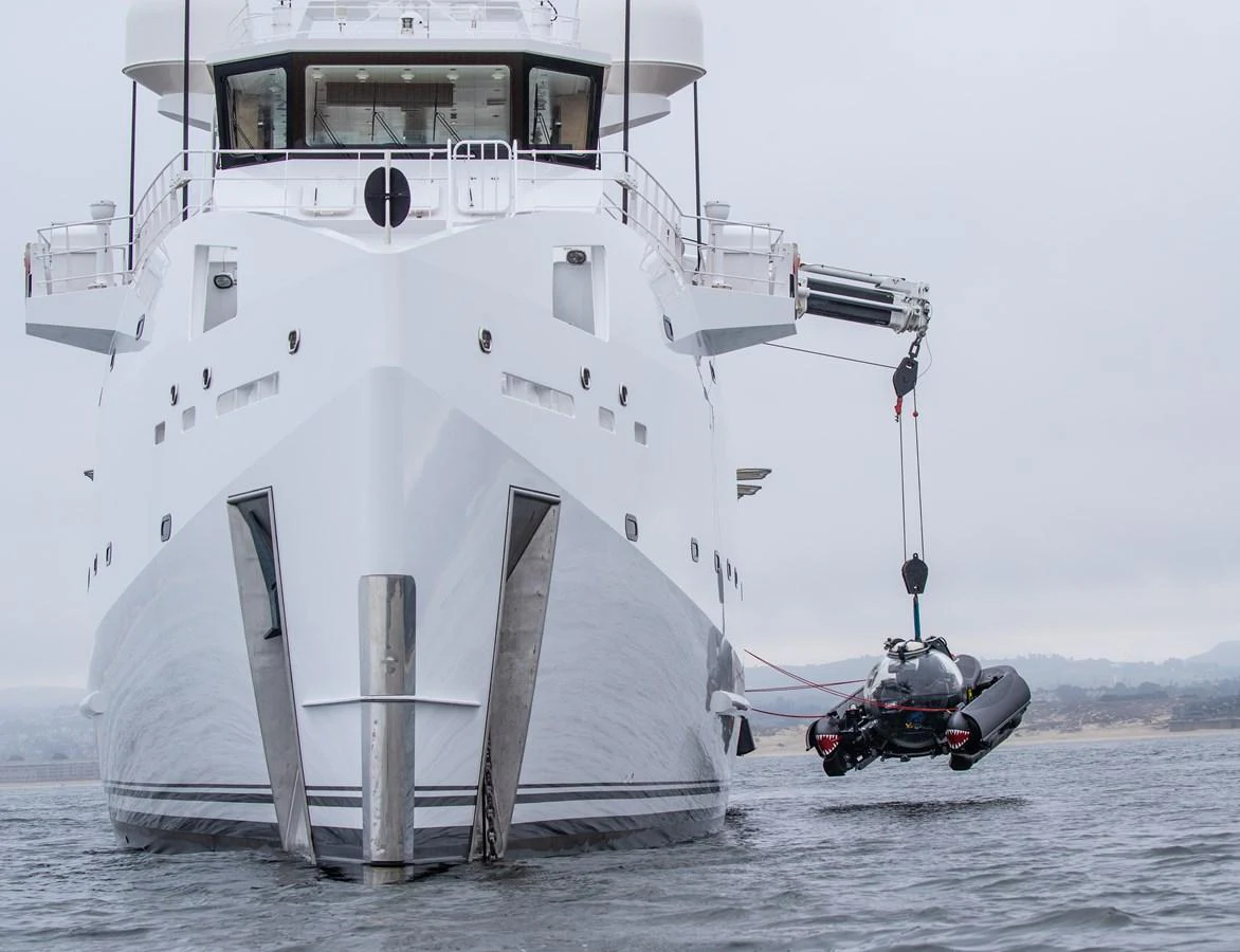 a boat with a motor attached to it aboard INDRATUS Yacht for Sale