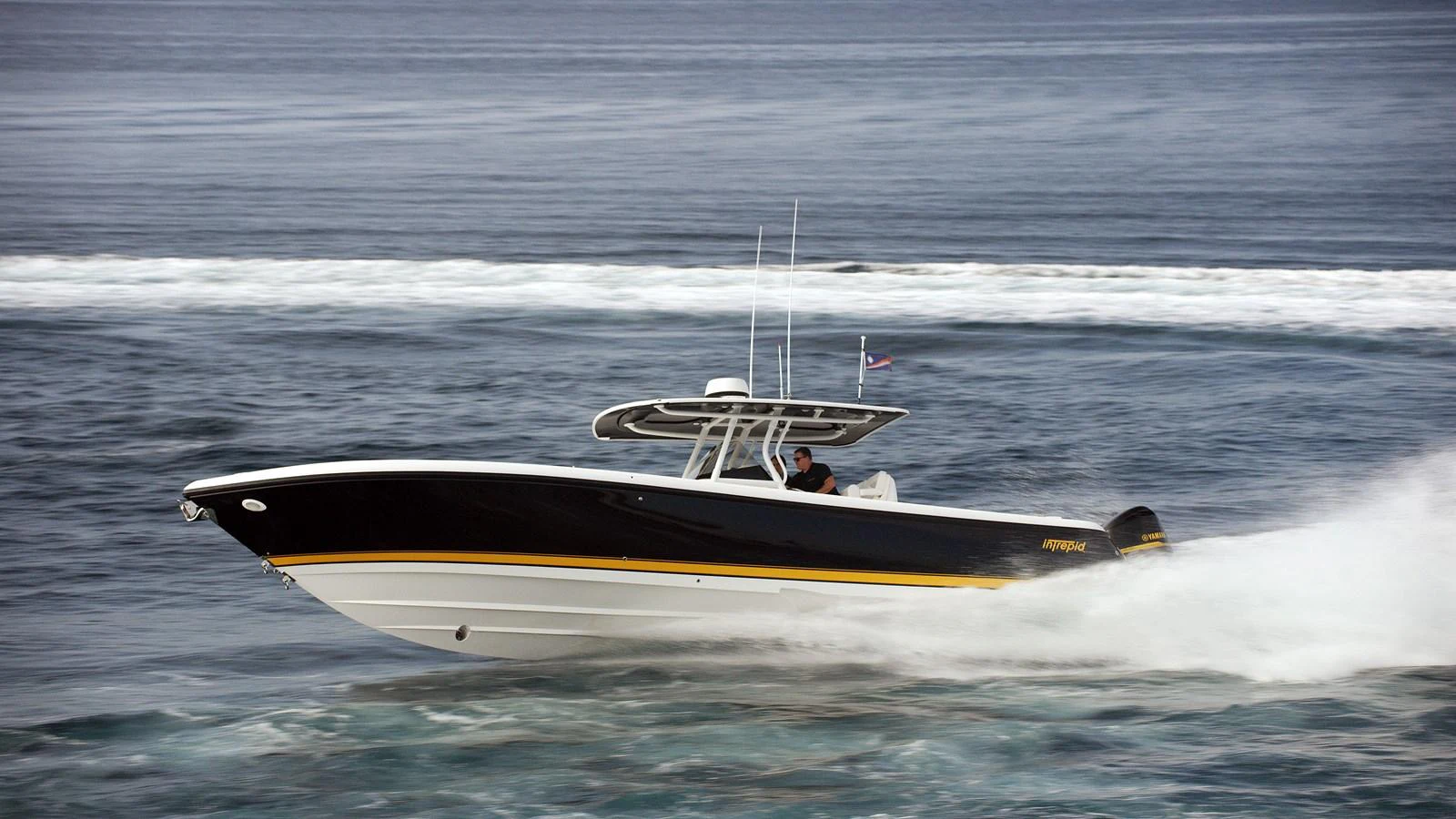 a boat in the water aboard INDRATUS Yacht for Sale