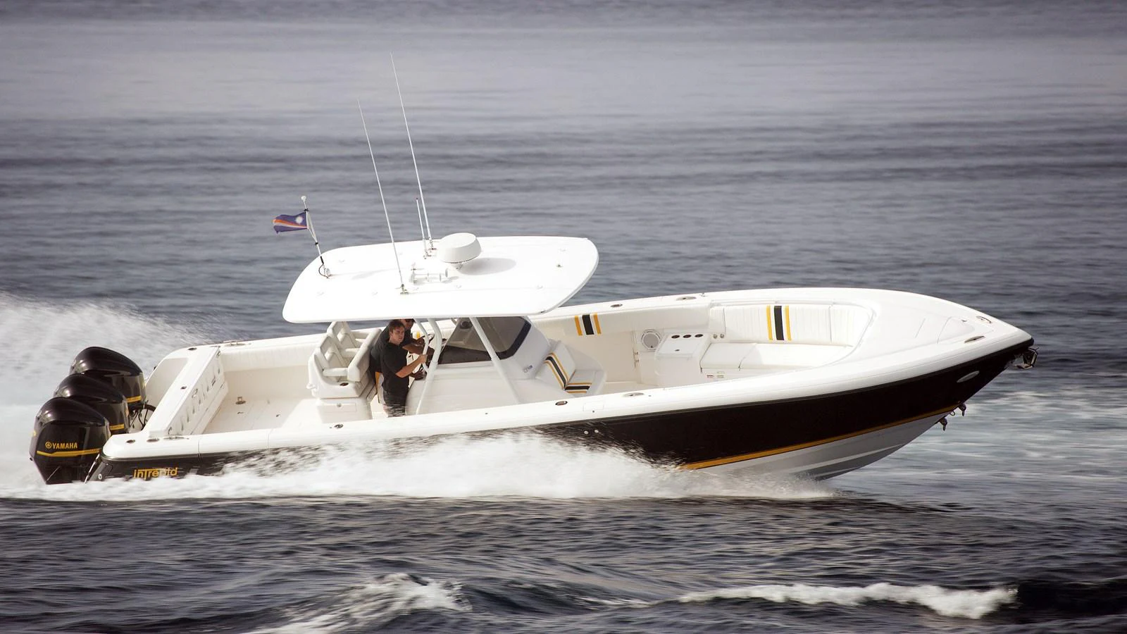 a boat in the water aboard INDRATUS Yacht for Sale