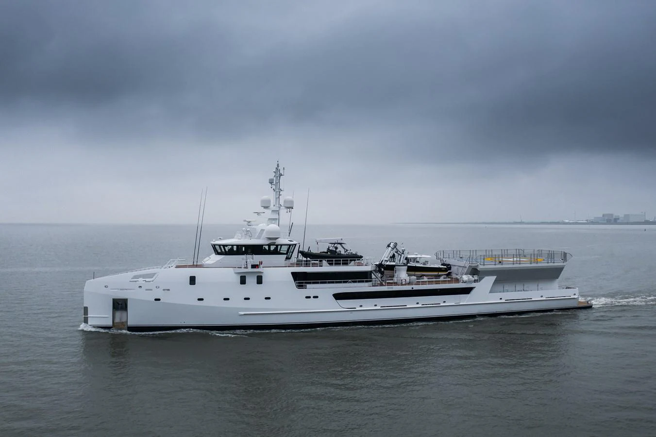 a white boat in the water aboard INDRATUS Yacht for Sale