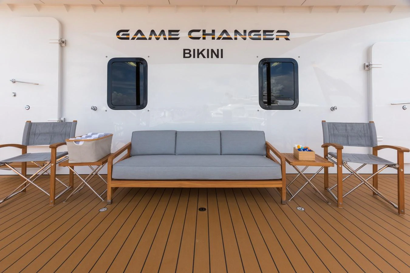 a room with a couch and chairs aboard INDRATUS Yacht for Sale