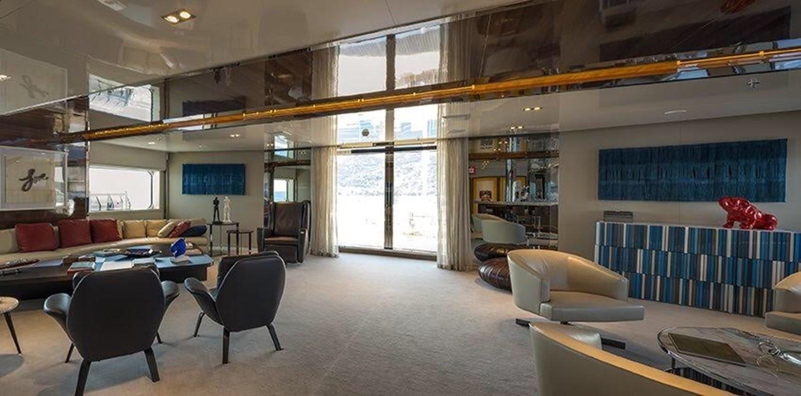 a large living room with a large window aboard MARQUISE Yacht for Sale