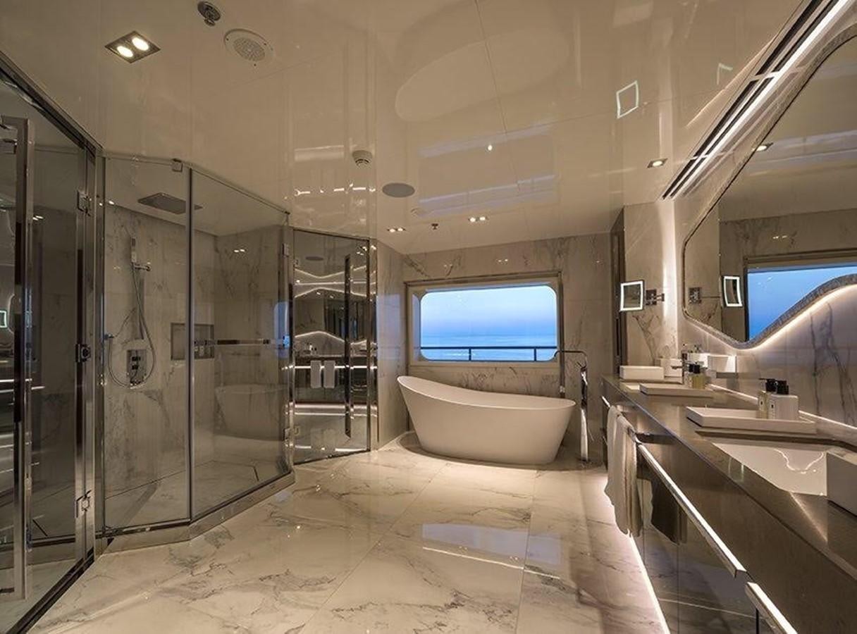 a bathroom with a large glass shower aboard MARQUISE Yacht for Sale