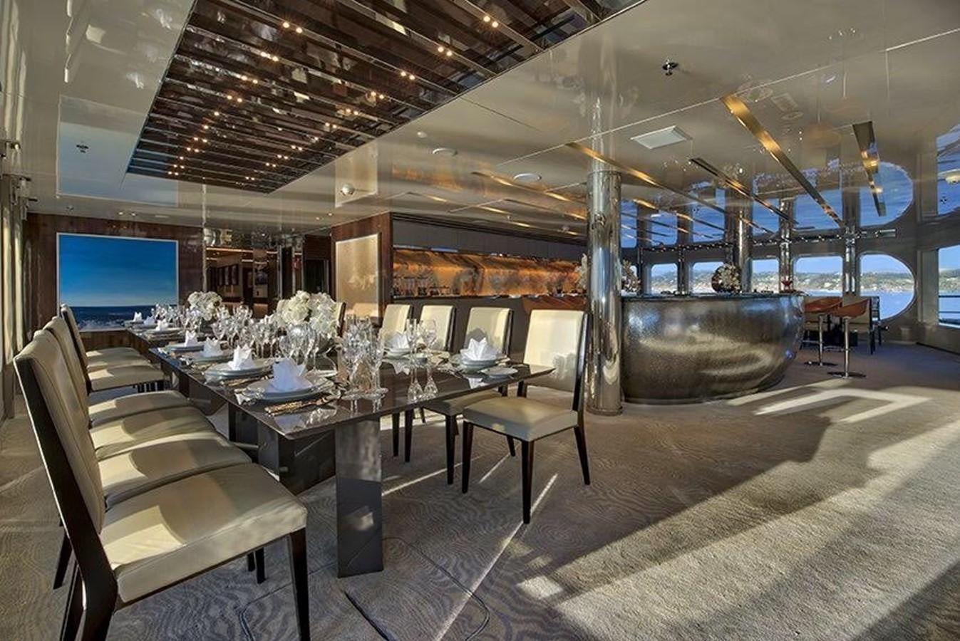 a room with a table and chairs aboard MARQUISE Yacht for Sale
