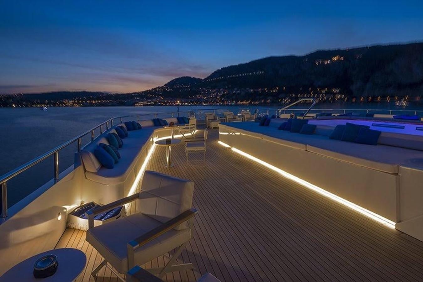 a deck with a view of a city and water aboard MARQUISE Yacht for Sale