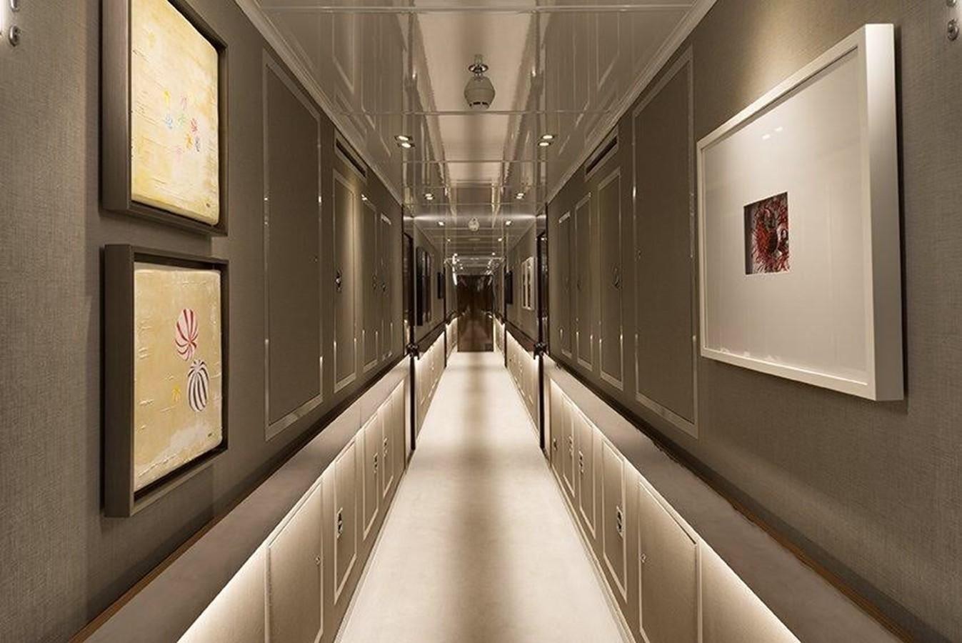 a hallway with several paintings aboard MARQUISE Yacht for Sale