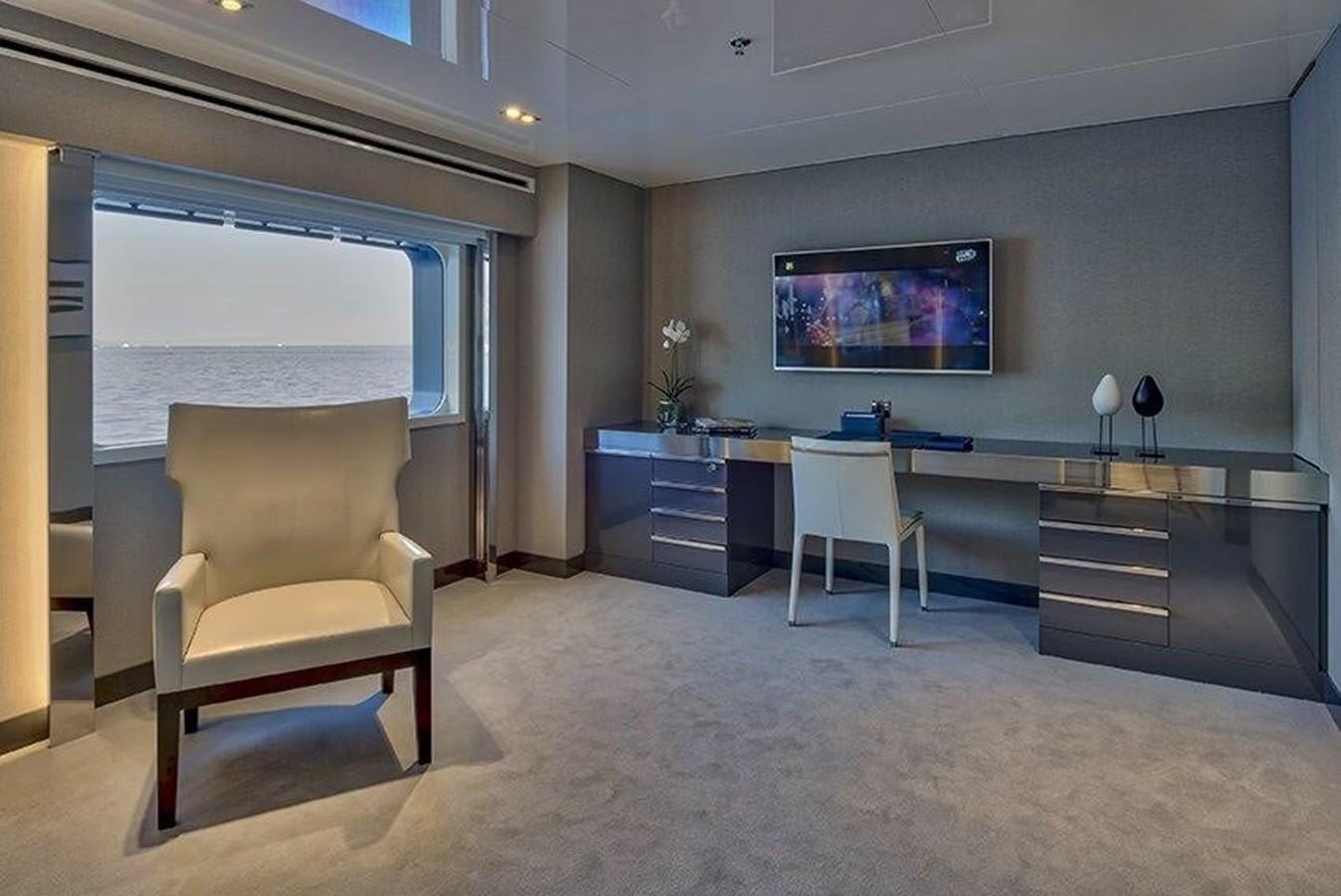 a room with a desk and chairs aboard MARQUISE Yacht for Sale