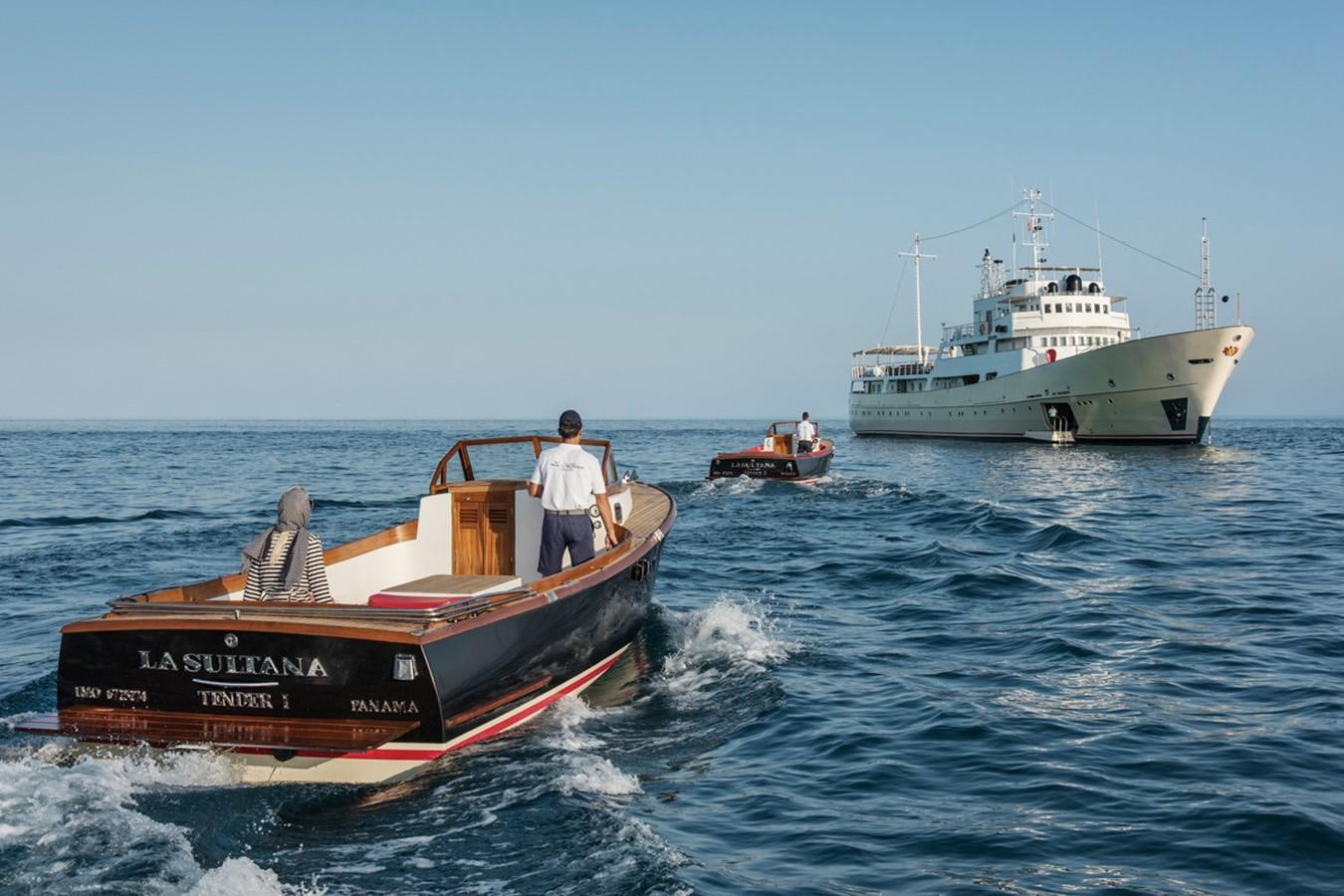 a boat and a boat in the water aboard NORTH SEA Yacht for Sale