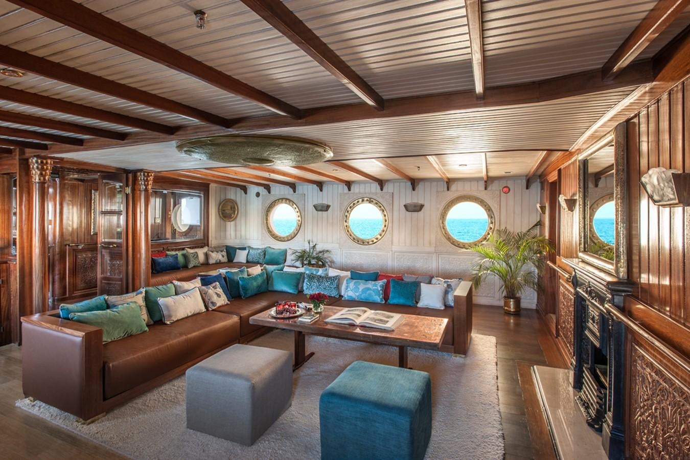 a living room with a couch and a table aboard NORTH SEA Yacht for Sale